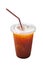Cold lemon iced tea in take away plastic cup with straw and condensed water droplets on outside surface, summer refreshing drink