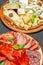 Cold meat cheese plate with salami chorizo sausage and various type of cheese