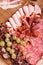 Cold meat plate, slices prosciutto, ham,beef jerky, sausage