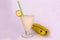 Cold milky banana smoothie on a white background. Copy space.