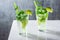 Cold Mojito Cocktails with Mint and Lime on Bar