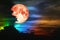 Cold moon on colorful cloud rainbow on night sky