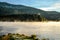 Cold morning dust floating over norwegian landscape