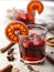 Cold mulled wine with cherry and bloody orange. Vertical shot. Close-up. Alcoholic beverage still life