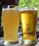 Cold nonfiltered beer, cold light beer costs on a heat and sweats, the sweating glass with beer, beer on a heat, beer,