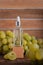 Cold pressed grape oil. Organic bio care products with natural ingredients. Close-up grapes and copy space. Halved grapes and grap