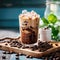 Cold refreshing coffee with ice in a tall glass on a wooden board close-up, cocoa beans are scattered on the table, Blue