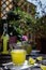 Cold refreshing tarragon, blackberry and raspberry lemonade with ice on wooden rustic table i