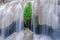 Cold river waterfall cascade falling down on stones, Clean blue water flows on cascades of Erawan park in Thailand