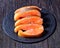 Cold-smoked arctic char on a wooden background