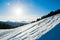 Cold snow ski slope on Alps mountain, France