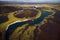 Cold summer landscape in valley with Iceland aerial river