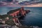 Cold sunset at the Neist point lighthouse, Scotland, UK