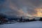 Cold sunset in the snow-covered taiga