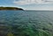 Cold turquoise waters of lake superior off the breakwater facing presque island in marquette michigan