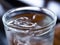 Cold water glass with ice cubes, Water drops, Close up & Macro shot, Selective focus, Healthy Drink concept