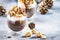 Cold winter chocolate dessert with whipped cream, popcorn and caramel topping in glasses on beige background, place for text