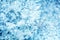 Cold winter glitter background with snowflake