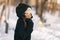 Cold winter protection Asian woman protecting skin covering nose and mouth with warm scarf - cold weather clothes