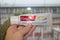 Colgate Toothpaste being Held by Hand