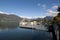 COLICO, ITALY, November 09, 2019 Colico embankment panoramic view with ships and mountains on back , Lake Como, Northern