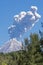 Colima volcano with steam eruption