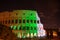 Coliseum at night with multi-colored illumination