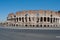 The Coliseum from the outside, Roman architecture with stones. Ancient and historical monument in Europe.