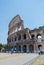 The Coliseum from the outside, Roman architecture with stones. Ancient and historical monument in Europe.