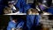 Collage close-up of a male welder in a hard hat and glasses, protective suit and gloves, who is engaged in argon welding