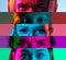 Collage of cropped multiethnic male and female eyes placed on narrow stripes in neon lights.