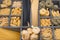 A collage with different stuffed pasta such as fusillini, sedani rigati, spaghetti, linguine, fettuccine in rustic old wooden box