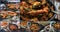 Collage of different views of a Spanish seafood paella