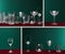 Collage of drinking glasses on red velour surface