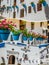 Collage of Mijas with flower pots in facades. Andalusian white village. Costa del Sol