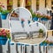 Collage of Mijas with flower pots in facades. Andalusian white village. Costa del Sol