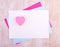 Collage papers with heart stickers