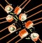 Collage of philadelphia sushi rolls on background