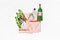 Collage portrait of two mini black white gamma girls push wine bottle hold fresh grape fruit isolated on creative