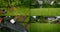 Collage shooting of a man who is in the country, wearing protective glasses, he mows the grass with a lawn mower, which