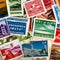 A collage of vintage postage stamps from around the world, showcasing diverse cultures and histories3, Generative AI