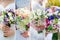 Collage of wedding bouquets in the hands of the bride