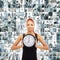 A collage of a woman holding a clock on a business background