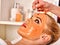 Collagen face mask . Facial skin treatment. Woman receiving cosmetic procedure.