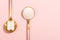 Collagen powder and pills on pink background