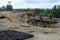 Collapsed insulated roof structures of an industrial building after explosion and fire