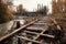 collapsed wooden bridge with a dried-up riverbed