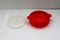 Collapsible red silicone container for microwave popcorn