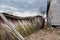 Collapsing abandoned barn with farmhouse