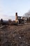 Collapsing, Abandoned House on Barren Street at Sunset